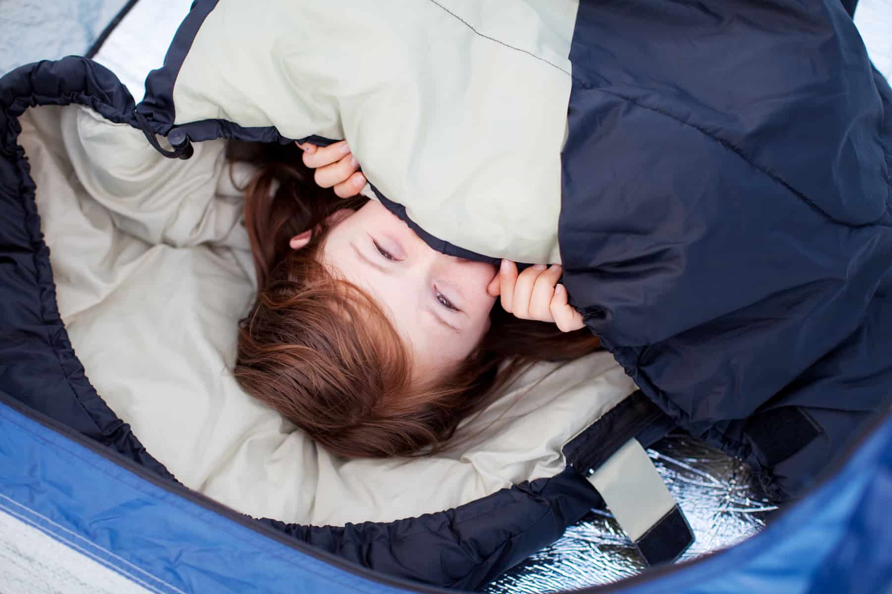 Little Girl Lying In Sleeping Bag