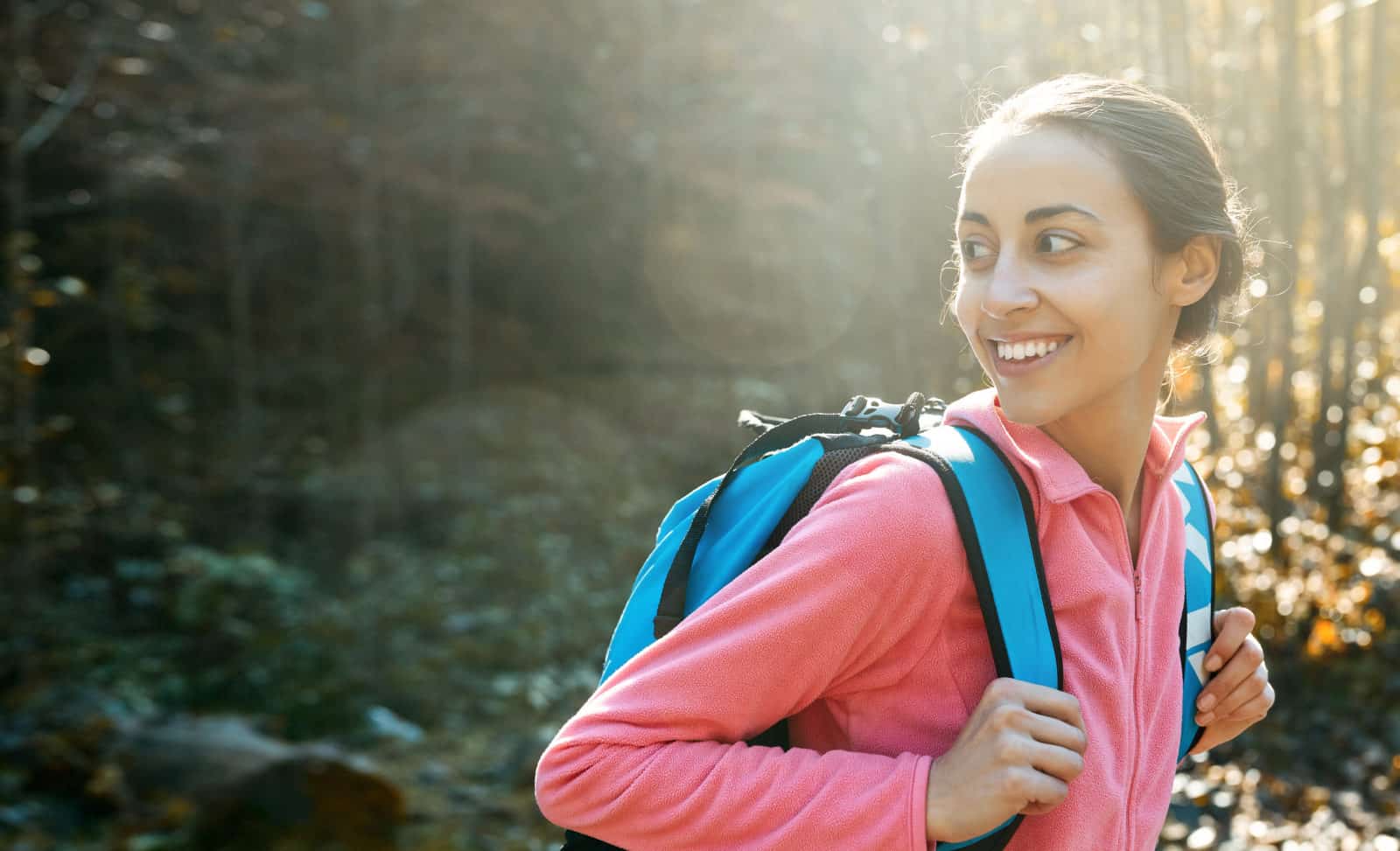 Woman hiker wearing a fleece jacket