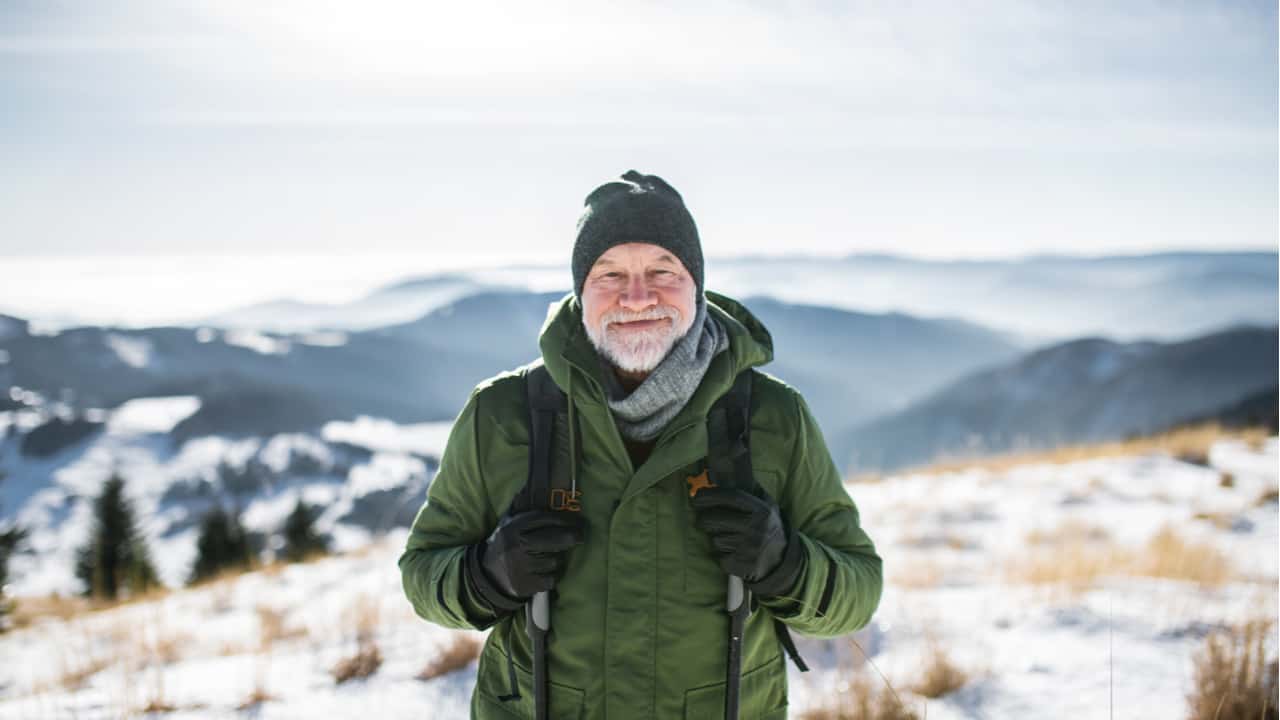 Hiker wearing a jacket in winter