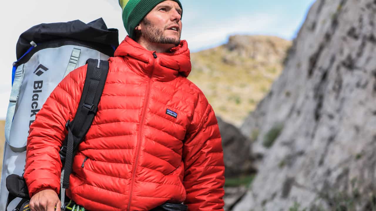 HIker wears a red patagonia jacket