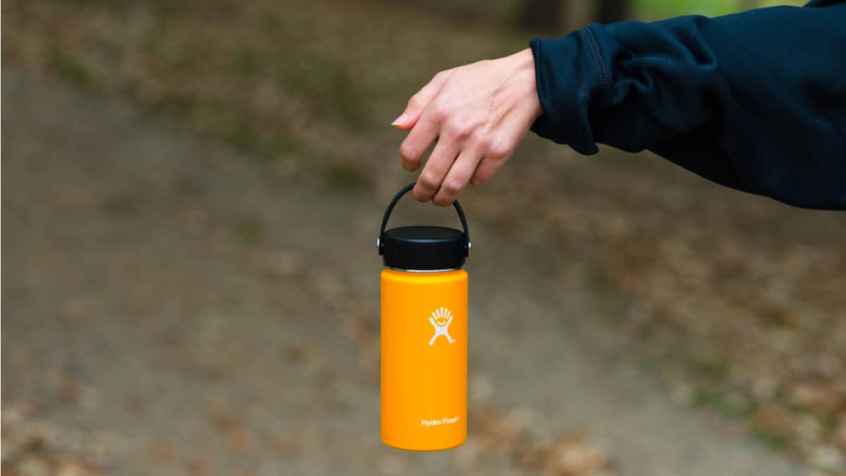 Hiker with a yellow Hydro Flask