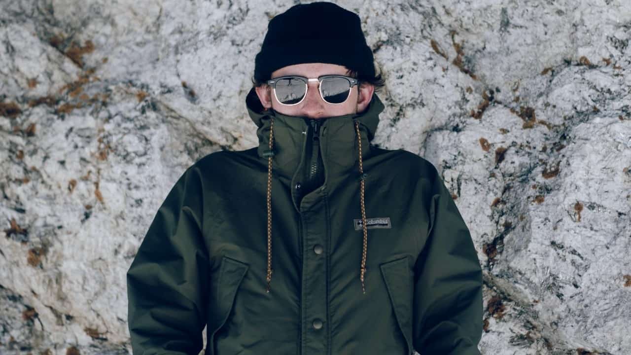 Male hiker wearing a Columbia winter jacket