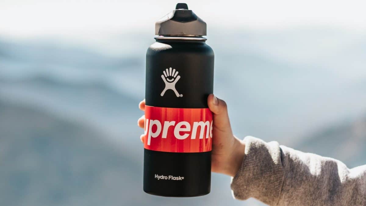 Person holding a Hydro Flask bottle