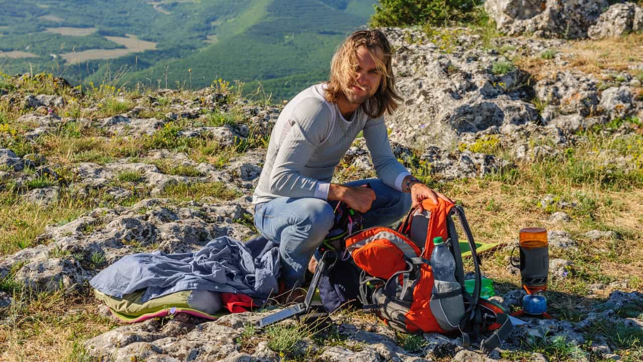 Hiker using a stove
