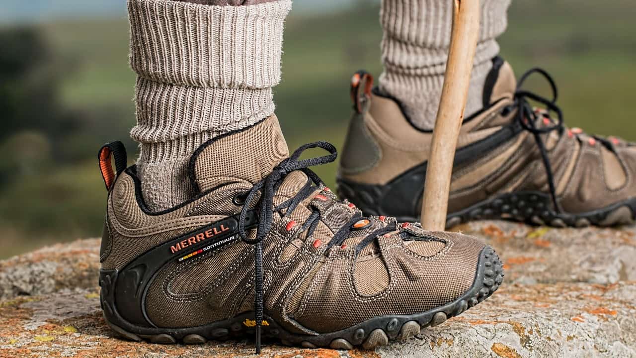Hiker Wears Merrell Shoes