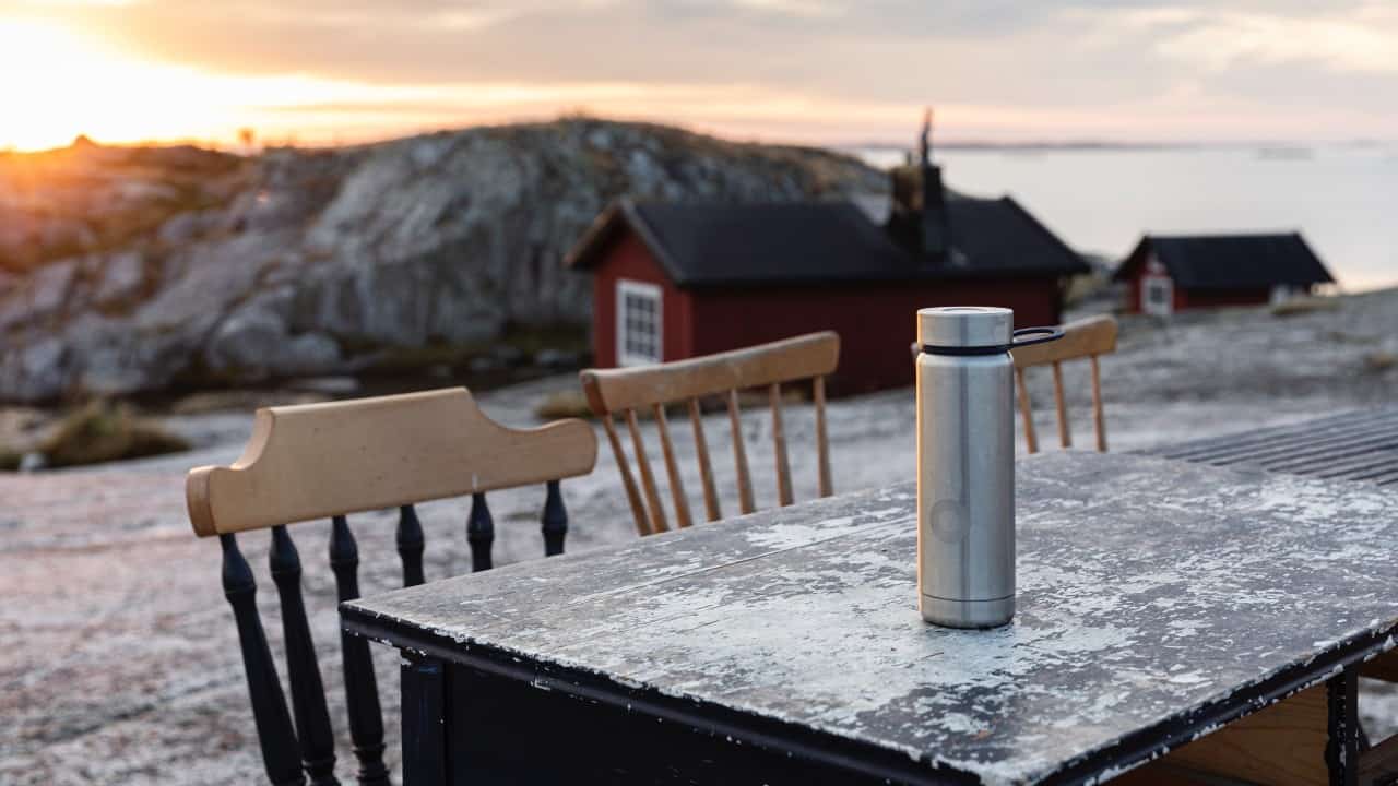 Stainless steel bottle on a table