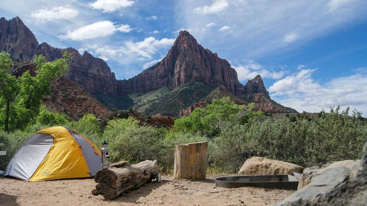 Yellow tent and a bottle at a campground in Zion National Park
