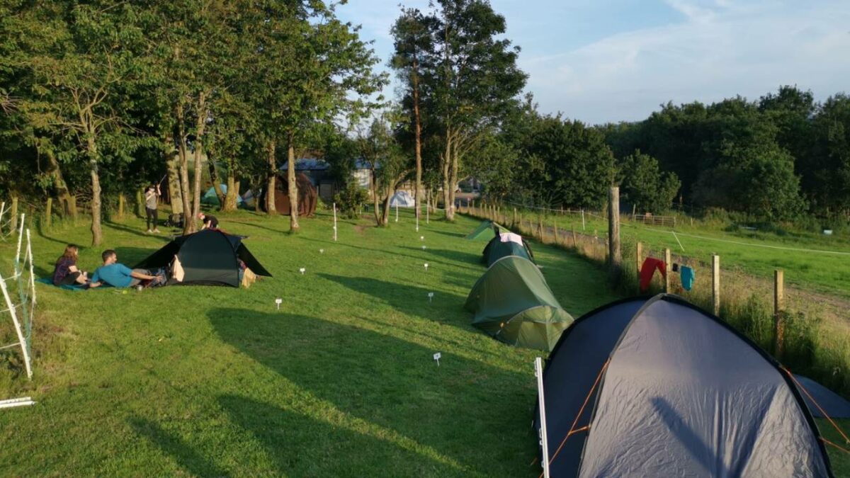 Campers and tents at Drymen Camping on the West Highland Way