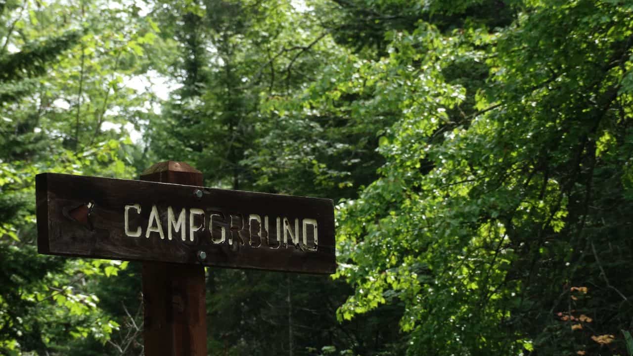Campground sign in a forest
