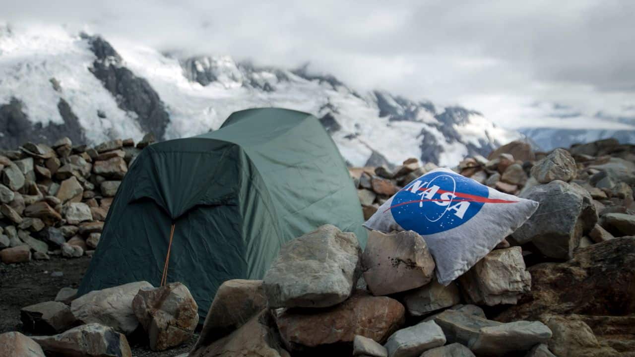 NASA camping pillow next to a tent