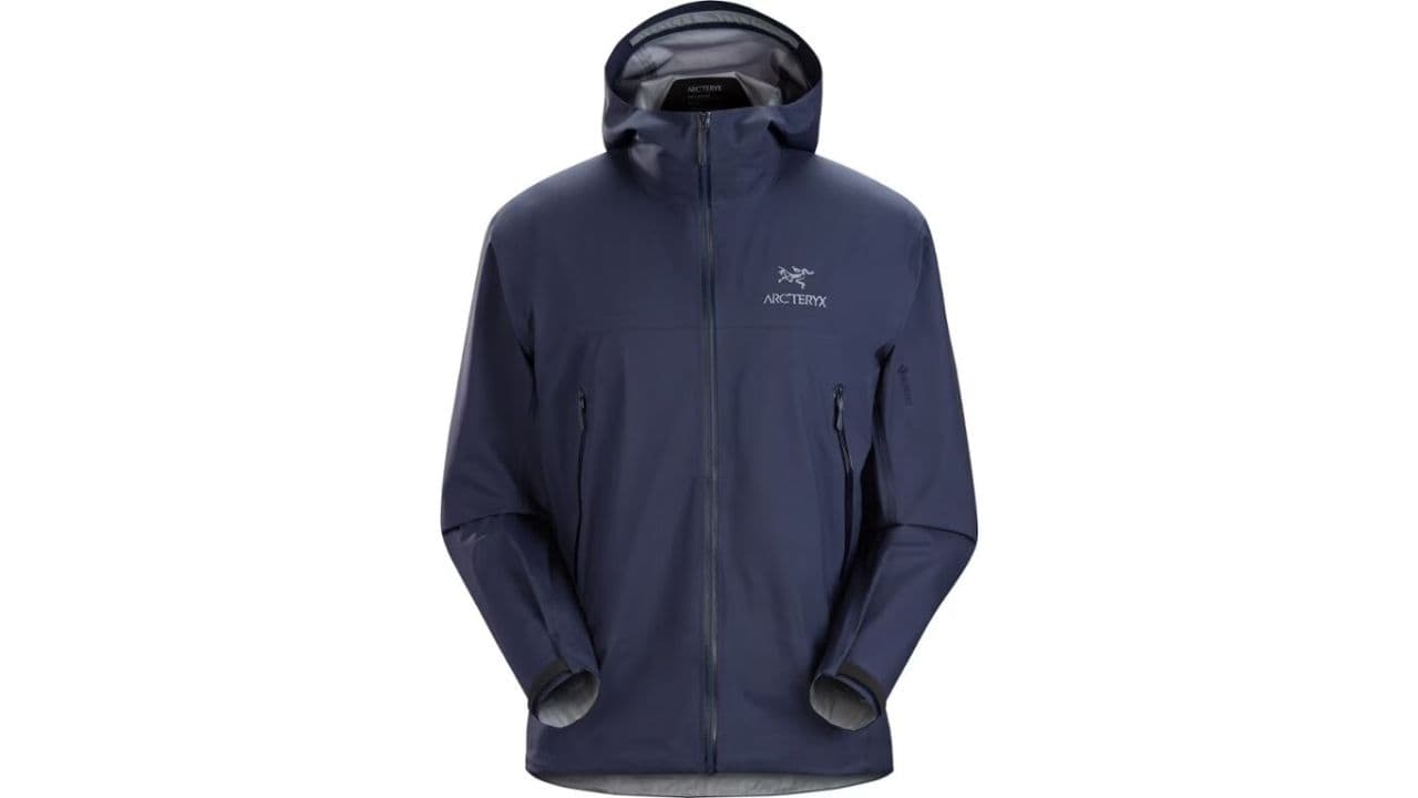 A blue Arc'teryx weather-resistant jacket with a hood
